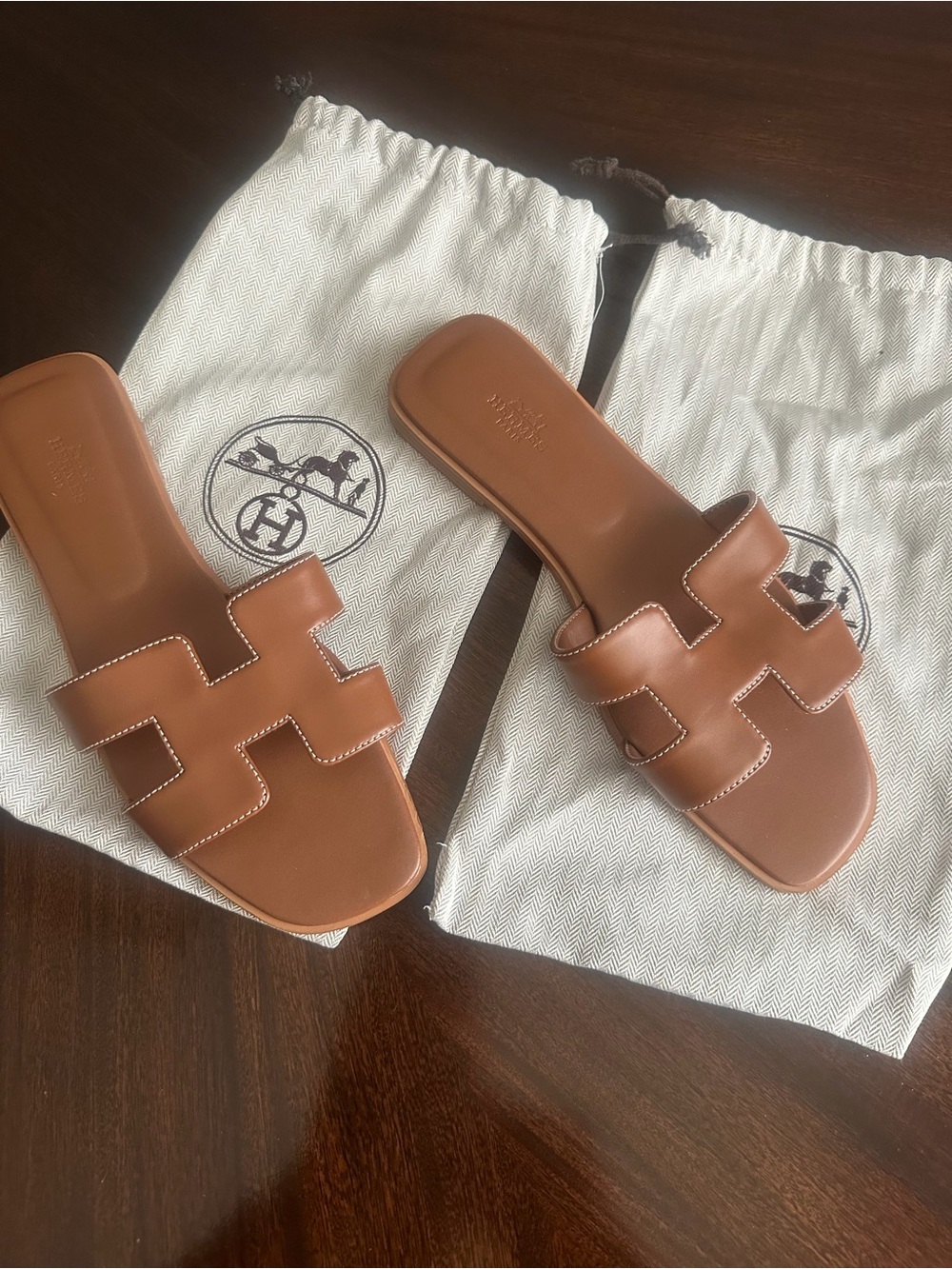 Brand new women’s Oran similar style sandals. Retail $900 Size 9
